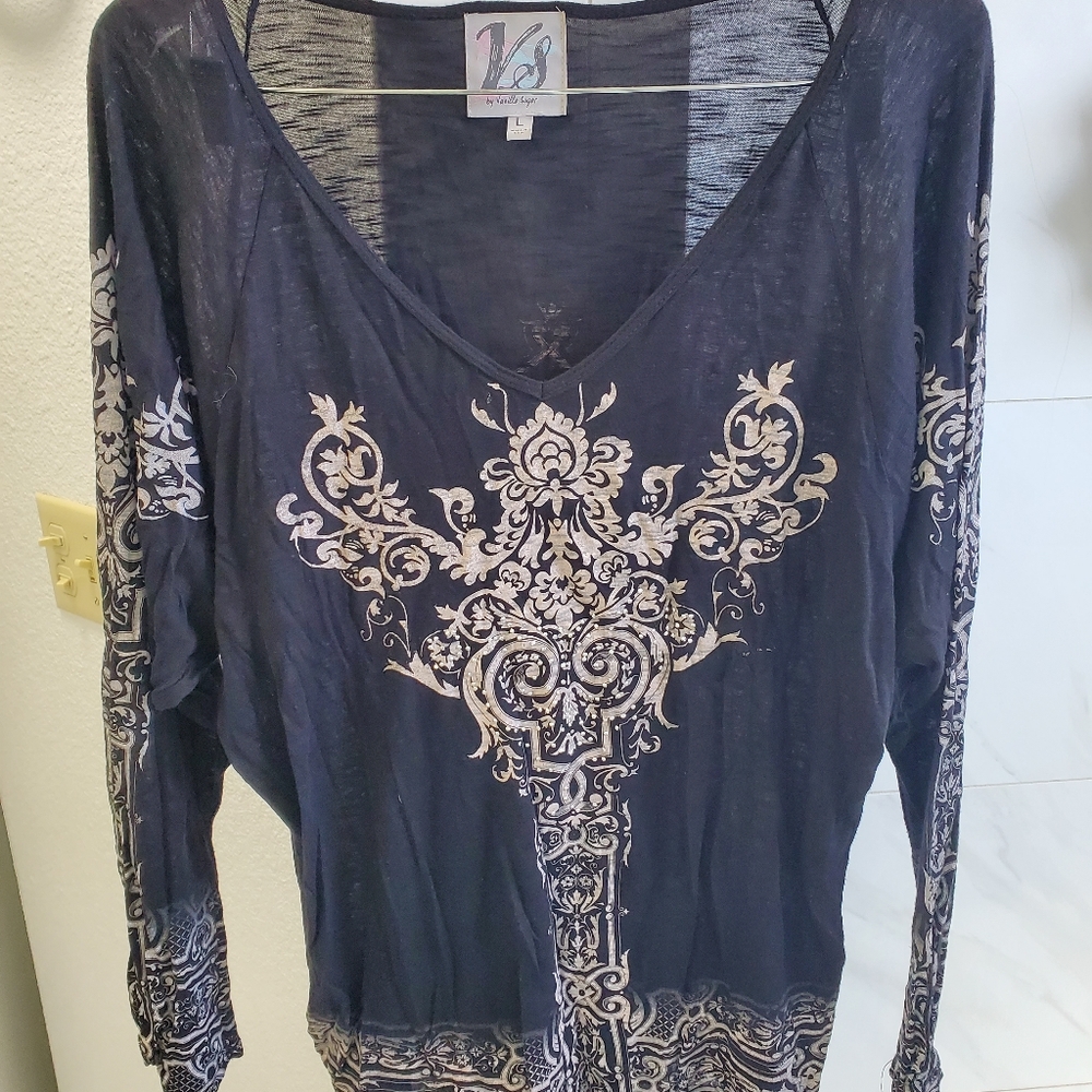 Size L Vanilla Sugar.  Black & cream. With beautiful silver  embellishments. 30$